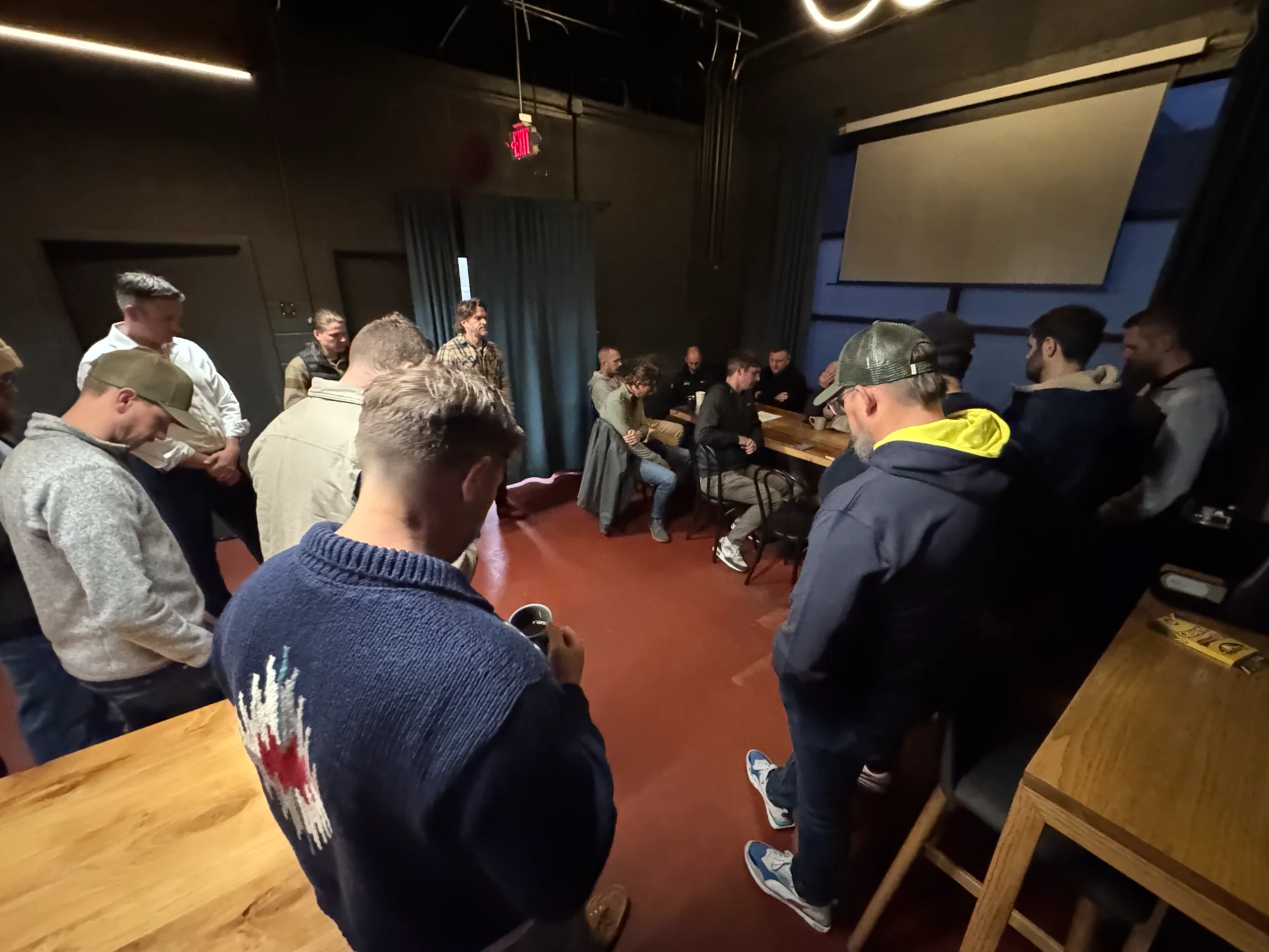 Men gathering in prayer